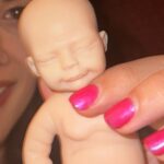 Patti Harrison Instagram - If given the chance i think id be a good mom because id hold the baby like this. And when people in public would yell at me for holding it this way, id say “im so sorry. This better?” Then I’d hold it the right way …and everyone would smile 😊 (P.S- she is awake in these photos! I had her close her eyes for the flash 😌)