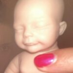 Patti Harrison Instagram - If given the chance i think id be a good mom because id hold the baby like this. And when people in public would yell at me for holding it this way, id say “im so sorry. This better?” Then I’d hold it the right way …and everyone would smile 😊 (P.S- she is awake in these photos! I had her close her eyes for the flash 😌)