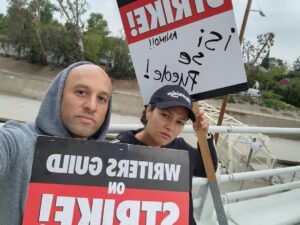 Paula Garcés Instagram - Mean muggin!! With my friend @wgaeast & @writersguildwest member @cbyt on the #picketline #writersstrike !
I’m a  @directorsguild & @sagaftra member who is supporting all of my writer friends who without them I would not have a career as an actor or a director!! Without writers there’s no stories for me to help tell & no work so please please support!!!
Thank you !
#writersstrike2023 #dga #wga #sagaftra #actress #director #latinadirector #onthepicketline 
Scroll for more pics
Hoping for a fair deal a resolution that will get us back to work so that we can keep telling stories!
#fairdealforwriters #fairdealforworkers