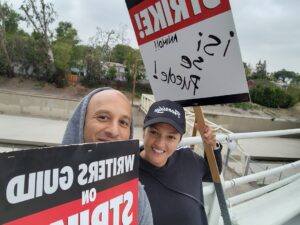 Paula Garcés Instagram - Mean muggin!! With my friend @wgaeast & @writersguildwest member @cbyt on the #picketline #writersstrike !
I’m a  @directorsguild & @sagaftra member who is supporting all of my writer friends who without them I would not have a career as an actor or a director!! Without writers there’s no stories for me to help tell & no work so please please support!!!
Thank you !
#writersstrike2023 #dga #wga #sagaftra #actress #director #latinadirector #onthepicketline 
Scroll for more pics
Hoping for a fair deal a resolution that will get us back to work so that we can keep telling stories!
#fairdealforwriters #fairdealforworkers
