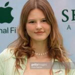 Peyton Kennedy Instagram – Thanks Apple  💚 LUCK premieres August 5th ☔️ 🐈‍⬛