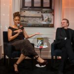 Phoebe Robinson Instagram - When I was asked to interview my friend/mentor Bono at a private book party (hosted by @Bloombergdotorg) celebrating his NYT memoir “Surrender,” I thot to myself, “In my book club, we all getting half chubs,” hence me serving body-ody-ody in a Hershey’s chocolate bar 🍫 wrapping. Jokes aside, this was legit one of the best days of my life. ⠀ Like thirteen year old me would’ve geeked over the opportunity and also fluffed out her Civil Rights era banyang. Seriously, when I was younger I looked I could’ve been in what was originally the Little Rock Ten, but alas I missed it all because I overslept the night before, so Nine it was! ANYWAY! The point is sometimes you dream of and hope for and manifest certain things, but the universe has a way of surprising you with even more when you surrender to it. ⠀ To kiki with a person whose music and philanthropy has meant so much to my life was a dream come true. To hear the way he speaks of and writes about Ali, his wife of 40 years moved me to tears. The way his band mates - Edge, Adam, & Larry - have bettered him in ways that he’s long known and ways he’s still discovering is touching without being overly sentimental. And to watch him take his passions seriously in one breath and then also take the piss out of himself the next is a masterclass in authenticity. He’s a thoroughly self-possessed person, which is probably the most beautiful thing about him. ⠀ So thanks, B, for the pleasure of your friendship, the gift of your generosity, and welcoming me deeper into the @red family by having me join the Advisory Board (I know B said Creative Council, but it’s the Advisory Board). I can’t wait to get to work and help the debilitating presence HIV/AIDS still has in this world. You, (RED), and so much more continue to make this the ride of a lifetime. So I’mma buckle up and keep dressing like some dude’s future second wife that he’s about to meet. 😂😏🤷🏾‍♀️. #FBF ⠀ Hair: @lurissaingridhair Makeup: @fatimotisadare Styling: Moi Dress: @alexperryofficial Shoes: #BottegaVeneta Earrings: @cloverpost