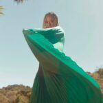 Phoebe Robinson Instagram - #ThotNaysh, I went to a Home Goods -#FrugalShopper - and saw a quote on a faux wood board that read “Happiness is when you feel good about yourself without feeling the need for anyone else’s approval” and I FELT that ish. My happiness comes from a variety of things but I was feelin’ like Naomi Campbell minus throw in’ phones during this shoot. 🤣🤣 📸: @raulromo Hair: @sabsthegoodgirl Makeup: @alanapalaumakeup Styling: @elenalark assisted by @iamnot_shialabeouf @mia_navarro_ Dress: @semsem Heels: @dolcevita Jewelry: @jenniferfisherjewelry