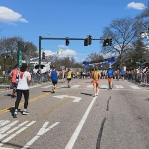 Phoebe Robinson Instagram - I CAN. FUCKING. DO. ANYTHING. I started running last March as a new hobby. Fell in love with it. Did some races. And last September, (RED) asked me to run this race for them. And I did it! Wow. Surprising yourself is the coolest thing! Cannot wait to do another marathon! 

Running the @bostonmarathon with a chest cold is a specific kind of masochistic hell. 10 out of 10 do not recommend. Haha. But for real, the race was a surreal, incredible, once in a lifetime experience. No matter how much you prep, train, when it’s race day, you just have to meet the moment & see what you’re really made of. I saw ppl vomiting, limping, struggling; my parents lost count of how many people they saw pass out at or near the finish line. The Boston Marathon is a beast like no other and sick or not, I refused to give up.

1) Post race right after I go my medal, my dad took this photo. I was so happy, tired, and proud of myself. Baby is a marathoner!
2) On Saturday, @bankofamerica invited me and the rest of Team (RED) to a Red Sox game and I got to represent (RED) on the field during special recognition before the game started. Jumpsuit: @wearewildfang 
3) Team @red - @dan_churchill, @jeffreymce, @bellezel & I - got to pose with the World Champion trophy. Neat!
4) My parents showed up looking fly AF in their matching Boston Marathon jackets that I got them. 🥰🥰
5) (RED) gang pre-race.
6) Me right before getting my marathon cherry popped.
7) Saw so many great signs thruout the race. This made me stop and laugh so hard.
8) Heartbreak Hill was no joke. Truly was hard. About 13 miles into the marathon, it felt like someone was pressing down/sitting on my chest, but I remained calm and stuck to my plan: running up HH, which was between miles 20 and 21 and lasted 1/2 mile, without stopping. And I did it!
9) This was towards the end. I was fighting for my life for the last 4 miles. I told myself to keep moving. Never stop. And remember my why: I’m doing this for (RED). It’s bigger than me. But also: this IS for me. To test myself mentally and physically.
10) My dad took the photo. He tidied up all the tables behind me because they were messy with food. #DadsOfInstagram #BostonMarathon