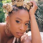 Phoebe Robinson Instagram - Hey, heauxes! I’m moisturized, minding my business, and drinking my green juice! 📸: @valentinatakespics Hair: @sabsthegoodgirl Makeup: @alanapalaumakeup Styling: @elenalark assisted by @kitoogarcia @iamnot_shialabeouf @mia_navarro_ Top: @sandyliang Earrings: @lauraestradajewelry Ring: @jenniferfisherjewelry