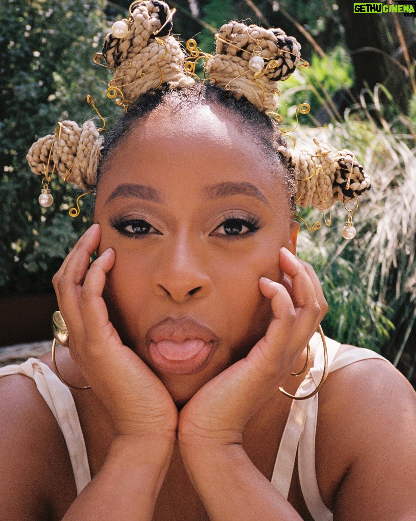 Phoebe Robinson Instagram - Hey, heauxes! I’m moisturized, minding my business, and drinking my green juice! 📸: @valentinatakespics Hair: @sabsthegoodgirl Makeup: @alanapalaumakeup Styling: @elenalark assisted by @kitoogarcia @iamnot_shialabeouf @mia_navarro_ Top: @sandyliang Earrings: @lauraestradajewelry Ring: @jenniferfisherjewelry