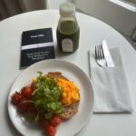 Phoebe Robinson Instagram - london wk 1 🇬🇧 1) cute af dress from @anthropologie and knock off cult gaia bag from Amazon 2) buildings were giving crayola crayons primary colors 3) nice lil run through kensington gardens 4) room service breakfast with green juice from pret, so I stay regular 5) shoes 6) @nottinghillbookshop. one of my all-time fav movies. almost cried standing outside it. “only” bought 6 books and a coffee mug. lol 7) crepe. i just thot she looked beautiful working, so I snapped the pic 8) new friend; delicious dessert (sticky toffee pudding with sweet potato ice cream) 9) “oppenheimer.” brilliant movie. perfectly acted. could watch cillian murphy’s face for hours. absolutely beautiful. 10) viva spice girls & gut health