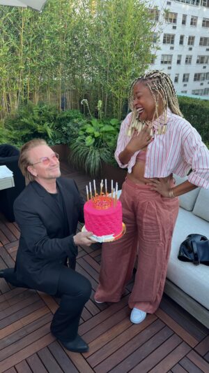 Phoebe Robinson Instagram - 38? More like Thirty-Great! Oh you goiis! You can’t walk out on me when it’s mah dang birthday 🎂!! Anyway, while this year has been exciting and groundbreaking for me, 2022 has also been Twenty Twenty Boo Boo (okay that was 🗑, lol) in a some ways personally and professionally. And after diff plans fell apart for my birthday this year, I kind of gave up. What I didn’t realize is that the yoon aka universe was protecting my Black ass and kept me in town so I could be reunited with my #ForeverThirstyThursday, my #IrishBae Bono who surprised me at a @one event with a cute serenade and delish red velvet cake from @bcakeny. I was shook, verklempt, and turned on! What a trifecta for a heaux like me! Will def emergency fap to this memory when necess! 🤣🥴🤷🏾‍♀️

B - thanks for being my hero, friend, and an incredible mentor. I’m learning so much from you and you’re helping make me a better person. Aww! Can’t wait to see what the future holds for us and (RED)! Xx