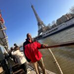Phoebe Robinson Instagram – #ThotNaysh, I took my brother to Paris for his birthday! Our first brother-sister trip! Look at us workaholics setting aside 3 days to hang! Proud of us:
1) PJ’s first time in Paris, so obvi we had to go the Eiffel Tower & walk all them steps!
2) Did a guided tour of the Louvre & chilled with Mona Lisa for a hot second!
3) The whole reason we went to Paris! See the Cavs take on the Brooklyn Nets! Got to go on the court afterwards! We also met the Cavs GM who was sitting behind us and liked PJ’s throwback Mark Price jersey!
4) Cavs won! Hell yeah! They’re looking good this year!
5) Big bro is vegan so I took us to this amazing Michelin star vegetarian restaurant @arpege and they did vegan dishes for him and I like this beetroot tartare. Delish! And the chef/owner Alain Passard was so nice!
6) Quick pit stop at @shakespeareandcoparis to buy a couple of books!
7) It was very cold, but I forced my brother take a pic of me outside the Louvre. 🤣🤣
8) I feel like these sculptures encapsulate so much of how society has been jacked up. Men too busy looking at their own 🍆 instead of acting right!
9) Did a cruise on the Seine. It was cold and fabulous!
10) Life is not life’ing if I’m not harassing my brother every five minutes. 🤣🤣🤣
Where should @robinsonforoh & I go next? I’m thinking we should do a trip every year!