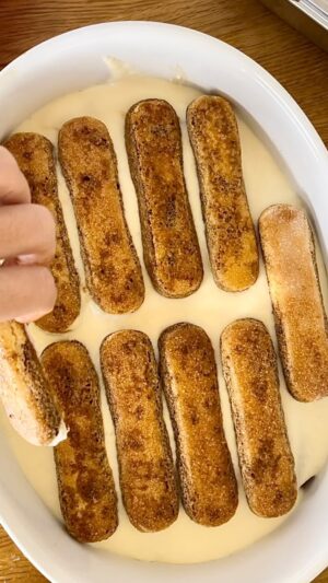 Pim Bubear Instagram - Tiramisu ❤️ 

Ingredients :

100g sugar 
4 medium eggs separated 
1/2 cup kahlua 
500 g mascarpone 
Coffee
Chocolate powder 
Lady fingers

Whisk 100g sugar with 4 egg yolks over a water bath till its at 70c 
Whisk in mascarpone (careful not to over whip or it will get lumpy ) 
Whisk egg whites till stiff peaks 
Fold into mascarpone mix 
Soak lady fingers in coffee and kahlua mix quickly and layer in a serving pan. 
Layer the mascarpone mix and repeat till again. 
Dust with chocolate powder and out in the fridge for atleast 3 hours or overnight to set ! 

#tiramisu #homemade #cooking #food #foodie #italiandesserts