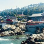 Piper Perabo Instagram - It was amazing to hear the monks chanting and the waves crashing at the same time. Haedong Yonggung Temple 해동 용궁사, Buddhist temple in Gijang-gun, #Busan, #SouthKorea on the East Sea. It honors Haesu Gwaneum Daebul (해수관음 대불), the Sea Goddess Buddha of Mercy. She appears before people in 33 different ways and even just saying her name repeatedly will help you accomplish your goal.