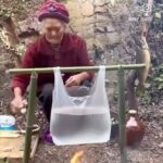 Poh Ling Yeow Instagram – It’s legit thermodynamics, guys! I couldn’t handle it anymore and hit up our fave doctoré of physics. So here’s the low down on why Grandma’s plastic bag ain’t melting, explained by @drmattagnew – thank u for letting us borrow your excellent brain 🪐💥. Now we can finally sleep in peace. And ppl please, of course I am not endorsing the use of this ‘appliance’. It’s obviously born of POVERTY so everyone please keep your bpa trigger knickers on and appreciate the science for just one moment! Also, sorry but the soundtrack WILL haunt you for days.

“Basically, the melting point of the plastic is *higher* than the boiling point of the water. What this means is that water will heat up to 100C, then begin boiling and the temperature won’t ever go higher. Since 100C is lower than the melting point of the plastic, it won’t melt.

It seems weird, but basically the heat from the flame will heat up the plastic, but once it reaches higher than the 100C, the heat will flow into the water (heat flows from hot to cold). Any additional heat added to the plastic will keep just flowing straight to the water so the plastic will also stay at 100C.

So this will continue until all the water is boiled off. Now there is nowhere for the heat to flow so the plastic will rise temperature quickly and then melt.”