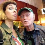 Pollyanna McIntosh Instagram - We laughed together a LOT, sometimes deliriously, like that time in the middle of the night at Sundance, representing 5,6 films, maybe more, huddled over our laptops, working like thieves but suddenly up doing totally inappropriate impressions of someone we liked but were unable to stop choke laughing about how they looked in their ski jacket, panicking about their film. We ate together a LOT. Salt’s Cure; Musso’s; the chicken Milanese and a martini at Arclight after a good movie, your back yard, later Morton’s by your new spot. Your capacity for ENJOYMENT was WONDERFUL. You bought me my first tasting menu at The George for my birthday during SXSW. So generous. And when I finally had payola you wanted to try Providence. Wow! That meal! We oohed and aaahd over it all. Playful place. “The sommelier is not a snob at all!” You were delighted. You taught me so much about food and wine and side cars and oysters and all sorts. The staff had better know what’s up. You brought your own fine napkins if things weren’t up to scratch. You were always educating, improving; sometimes someone was bold enough to give you the old side eye, sometimes it was me. We worked together, we played together. I always wanted to bring boyfriends over to meet you. You didn’t always approve of my boyfriends. You could never understand “Why do straight people have to be so REGULAR about their relationships?!” I trimmed your nose and ear hair after the stroke, cut your nails, cleaned out your ears. You were no friend to shame. Onwards! Thank you to @mptf for taking care of you. Love to all out there grieving Mickey’s loss. I have missed you and do still. I bet you’re dancing your tits off in heaven with a hot hunk in an angel costume. ❤️❤️❤️👊👊👊🙌🧡🧡🧡 #mickeycottrell #RIP