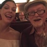 Pollyanna McIntosh Instagram - We laughed together a LOT, sometimes deliriously, like that time in the middle of the night at Sundance, representing 5,6 films, maybe more, huddled over our laptops, working like thieves but suddenly up doing totally inappropriate impressions of someone we liked but were unable to stop choke laughing about how they looked in their ski jacket, panicking about their film. We ate together a LOT. Salt’s Cure; Musso’s; the chicken Milanese and a martini at Arclight after a good movie, your back yard, later Morton’s by your new spot. Your capacity for ENJOYMENT was WONDERFUL. You bought me my first tasting menu at The George for my birthday during SXSW. So generous. And when I finally had payola you wanted to try Providence. Wow! That meal! We oohed and aaahd over it all. Playful place. “The sommelier is not a snob at all!” You were delighted. You taught me so much about food and wine and side cars and oysters and all sorts. The staff had better know what’s up. You brought your own fine napkins if things weren’t up to scratch. You were always educating, improving; sometimes someone was bold enough to give you the old side eye, sometimes it was me. We worked together, we played together. I always wanted to bring boyfriends over to meet you. You didn’t always approve of my boyfriends. You could never understand “Why do straight people have to be so REGULAR about their relationships?!” I trimmed your nose and ear hair after the stroke, cut your nails, cleaned out your ears. You were no friend to shame. Onwards! Thank you to @mptf for taking care of you. Love to all out there grieving Mickey’s loss. I have missed you and do still. I bet you’re dancing your tits off in heaven with a hot hunk in an angel costume. ❤️❤️❤️👊👊👊🙌🧡🧡🧡 #mickeycottrell #RIP