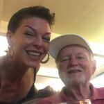 Pollyanna McIntosh Instagram - We laughed together a LOT, sometimes deliriously, like that time in the middle of the night at Sundance, representing 5,6 films, maybe more, huddled over our laptops, working like thieves but suddenly up doing totally inappropriate impressions of someone we liked but were unable to stop choke laughing about how they looked in their ski jacket, panicking about their film. We ate together a LOT. Salt’s Cure; Musso’s; the chicken Milanese and a martini at Arclight after a good movie, your back yard, later Morton’s by your new spot. Your capacity for ENJOYMENT was WONDERFUL. You bought me my first tasting menu at The George for my birthday during SXSW. So generous. And when I finally had payola you wanted to try Providence. Wow! That meal! We oohed and aaahd over it all. Playful place. “The sommelier is not a snob at all!” You were delighted. You taught me so much about food and wine and side cars and oysters and all sorts. The staff had better know what’s up. You brought your own fine napkins if things weren’t up to scratch. You were always educating, improving; sometimes someone was bold enough to give you the old side eye, sometimes it was me. We worked together, we played together. I always wanted to bring boyfriends over to meet you. You didn’t always approve of my boyfriends. You could never understand “Why do straight people have to be so REGULAR about their relationships?!” I trimmed your nose and ear hair after the stroke, cut your nails, cleaned out your ears. You were no friend to shame. Onwards! Thank you to @mptf for taking care of you. Love to all out there grieving Mickey’s loss. I have missed you and do still. I bet you’re dancing your tits off in heaven with a hot hunk in an angel costume. ❤️❤️❤️👊👊👊🙌🧡🧡🧡 #mickeycottrell #RIP