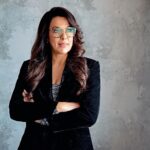 Pooja Bedi Instagram - How many versions of you exist? A passionate entrepreneur? A supportive spouse? A bewildered parent? A 3 a.m. friend? A child longing to play? A soul craving it's connection to the universe? How many parts of you do choose to negate as you hurry along the path of life instead of savoring your human journey? Follow your dreams, follow your heart, and most importantly always express what should never be suppressed. I'm loving my corporate avatar and all the joy @happysoullifestyle @magiciansofwellness brings with it. Thank u @powersutra for my corporate armour. The sexiness of velvet gives a lovely touch of glam to boring suits. @pinkiemakhijani you always Nail the moment @aafreenmakeupandhair you always make me look my best.