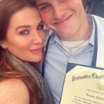 Poppy Montgomery Instagram – Congratulations to our beautiful boy! We are SO PROUD OF YOU!!!!
As you move on to the next round of life, remember that the greatest opponent you’ll ever face is the one in the mirror.  Keep being a beautiful force for good in the world. Always remember NOTHING IS IMPOSSIBLE. “Impossible is just a big word thrown around by small men who find it easier to live in the world they’ve been given than to explore the power they have to change it. Impossible is not a fact. It’s an opinion. Impossible is not a declaration. It’s a dare. Impossible is potential. Impossible is temporary. Impossible is nothing.” Especially for you!  WE LOVE YOU! HAPPY GRADUATION @braydonsanford_ 

😭😭😭😭😭😭#imnotcryingyourecrying