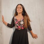 Preethiga Instagram - In a world that constantly craves novelty, there is something timeless about the beauty of a black Anarkali suit. And when it's adorned with vibrant floral embroidery, it's a match made in fashion heaven! The intricate needlework on the top of this Anarkali suit brings a burst of colours to the elegant black base, creating a stunning contrast that is both eye-catching and sophisticated. The embroidery on this Anarkali suit has been meticulously crafted with care and precision, with each stitch telling a story of its own. The multi-coloured floral pattern, with its delicate curves and loops, is a testimony to the skill and craftsmanship of the artisans who created it. It's a design that exudes femininity, grace and a sense of playfulness. Paired with this beautiful Anarkali suit are a pair of traditional Jhumkas that are the perfect accessory to complete the look. These statement earrings are handcrafted with intricate detailing that perfectly complements the floral embroidery on the Anarkali top. With their bold design and vibrant colours, they are sure to add a touch of glamour and elegance to any outfit. Whether it's a wedding, a festive occasion or a special event, this black Anarkali suit with multi-coloured floral embroidery is the perfect choice for any woman who wants to make a statement. It's a fusion of traditional and contemporary styles, where the timeless elegance of the Anarkali meets the vibrant energy of the floral embroidery. So go ahead, don this beautiful outfit with pride, and let your style speak volumes about who you are! @_gina_couture Captured: @saravanan_dop . #trendingreels #preethiga