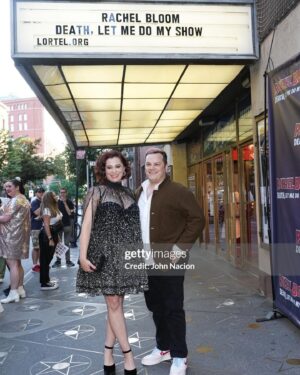 Rachel Bloom Instagram - We opened #deathletmedomyshow the other night and it was surreal. Thanks to @mikeandcarleeprods for making my dreams come true, @williamsburgpizza and @brookiescookiesnyc for the food and @pattilupone for giving us the best step-and-repeat photo of all time. 

Hair: @creightonbowman 
Makeup: @lisahoughton 
Styling: @arieltunnell 

Dress: @aliceandolivia 
Shoes: @larroude
Jewelry: @nickhorey
Clutch: @simitri.shop