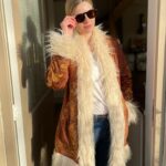 Rachel Hurd-Wood Instagram – Do you ever wish you’d been born in another time? Each decade carries such nostalgia even if the realities weren’t perfect. 

Let me know which decade you’d jump to in a time machine? Guess which mine would be 😉

My fab coat is by @thehippieshake 💫 

#70sfashion #gifted