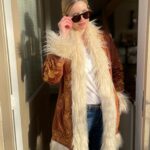 Rachel Hurd-Wood Instagram – Do you ever wish you’d been born in another time? Each decade carries such nostalgia even if the realities weren’t perfect. 

Let me know which decade you’d jump to in a time machine? Guess which mine would be 😉

My fab coat is by @thehippieshake 💫 

#70sfashion #gifted