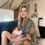 Rachel Hurd-Wood Instagram - Dreamy moments at home with my little girl. I’m sooo excited because we’ve just booked a holiday to California! 🇺🇸 It’s been ages since I’ve left the country (aside from a few days in Scotland last summer) and I can’t wait for some heat and a change of scene. ☀️ The last time I was in the US, I was pregnant with Liam - it’s funny to be travelling back there with my two children! If anyone has travel tips re. little ones, please do share! ✈️ Silky Kimono and headband by the wonderful @powder_uk #travel #holiday #gifted