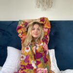 Rachel Hurd-Wood Instagram - Sunday mode 🛌 There’s so much emphasis on productivity and achieving that it’s easy to forget to slow down. Even though taking care of two small children is a full-time job in itself, I often feel under self-imposed pressure to ‘do more’. As the season changes, it’s a good time to slow down and prioritise rest wherever possible. Both mentally and physically. Cosy silky pyjamas from @powder_uk 🍂 (gifted).