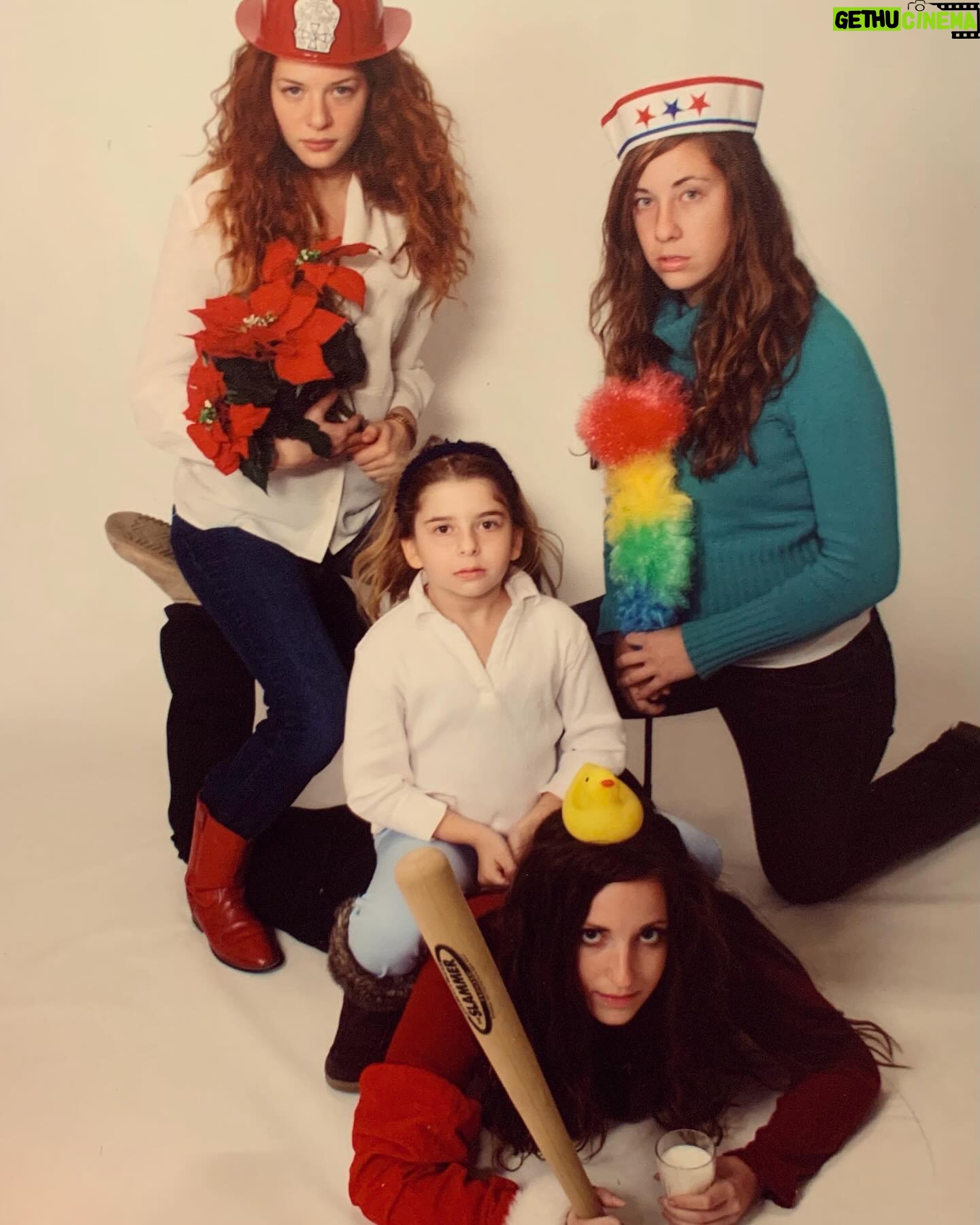 Rachelle Lefevre Instagram - Anyone else’s family go for holiday portraits? My sister’s and I had a different take. And yes, that’s a glass of milk my sister Miriam is holding, don’t even know where she got it. 🤷♀️ #flashback #familyportrait #sistersquad #sisters