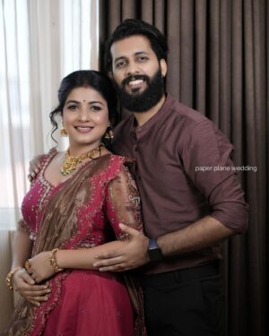 Raksha Raj Instagram - With the right person, you don’t have to work too hard to be happy. It just happens ❤️🧿
#Arksha
.
Photography : @paper_plane_wedding 
Attire : @evanshi_designs 
MUH : @zairmakeoverstudio
Jewels : @planetjewel