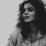 Ranjitha Menon Instagram - Perceiving things in monochrome offers a distinct viewpoint; doesn’t simplicity often enhance art? Life, as a canvas, reveals subtle nuances. Demeanor, individuality, and the warmth emitted—all contribute to the form. Whether it’s a contagious smile, enthusiasm for life, or savoring a cup of coffee, each detail enriches the narrative. Even expressions hold a distinctive essence, and emotions? They compose the unconventional soundtrack to navigate this journey. It’s all part of an evolving tale. So, are we in the light, the shadows, or somewhere in between this beautiful mess? 📷 @arunchandu #monochromatic #emotions #unconventional #random #pensive #mood