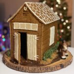 Rebecca Breeds Instagram - When you can’t get home for Christmas, you fill that whole in your heart with Gingerbread! I made a replica of the old Stable in our back yard, while Luke made Winterfell… (post Ramsey sacking)……. Very proud to say I made marzipan from scratch for the first time. Needs must. Oh - and sugar work!! Look out @bakewithrahul 💃🎄✨