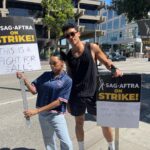 Regan Aliyah Instagram – day one of double strike. swipe for perfectly worded posts from community. 

art is a career & we’re tired of playing the starving artist. the post from @dsa_la said “we’re in a pivotal moment not just for workers in Hollywood, but for workers everywhere. If the bosses want a fight, we’ll give them a fight.” and i couldn’t agree more. 1% will profit insane amounts of money off our labor and threaten our livelihood when we ask for livable wages and basic rights. together, we are strong…strong enough to get to see the other side where things change for the better of the people. it doesn’t matter if you’re a non union actor/aspiring/eligible…this is a fight for all….for the future of our industries. 

& immense appreciation to all the WGA captains today!!