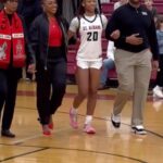Renee Montgomery Instagram - POV: Your Aunt flies in from LA just in time to surprise you for your Senior Night ❤️🖤❤️ #CoreMemories #Senior #basketball #family #love #familybonding