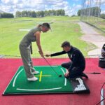 Rhian Sugden Instagram - 𝐓𝐞𝐞 𝐭𝐢𝐦𝐞 ⛳️ Oliver randomly got me golf lessons and I actually really enjoyed it (and I was quite good too wasn’t I? @jamieforshawgolf 👀😂) FORE!!! - not quite sure what that means but I know it’s what people say. 🏌🏼‍♀️ #golf #professionalgolfernow #golfcoach #golflessons #ballplay @traffordgolfcentre