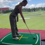 Rhian Sugden Instagram - 𝐓𝐞𝐞 𝐭𝐢𝐦𝐞 ⛳️ Oliver randomly got me golf lessons and I actually really enjoyed it (and I was quite good too wasn’t I? @jamieforshawgolf 👀😂) FORE!!! - not quite sure what that means but I know it’s what people say. 🏌🏼‍♀️ #golf #professionalgolfernow #golfcoach #golflessons #ballplay @traffordgolfcentre
