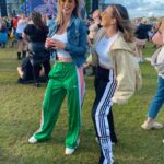 Rhian Sugden Instagram - Went to “90’s baby” festival! What a hoot!! I’m thinking we should bring popper pants back. @itsthenineteesbaby