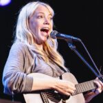 Riki Lindhome Instagram - It felt so good to get back on stage. I asked @britanickcomedy if I could play two non-comedy songs from my infertility musical on their comedy show and because it’s @bjmcelhaney & @nickkocher they said yes. Thank you for letting me serenade people with details about my endometrial lining. 🎶🤰 📸 by @jill.petracek