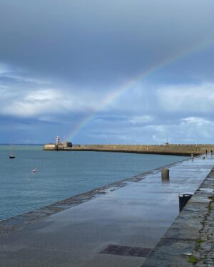 Roan Curtis Instagram - Sorry, sappy post incoming. Today I went and visited the town that my dad’s side of the family is from, Dun Laoghaire. My dad had given me a list of places to visit and the first on my list was the East Pier where my Mise (grandmother) used to go walking often. It was absolutely pissing rain and then as soon as I stepped out onto the pier, the clouds parted and this rainbow appeared. It felt like my passed relatives saying hello and welcome. It made me cry happy tears. Today I’ve visited the church where my grandparents got married, the house my Mise grew up in, the house my grandfather owned, and now I’m sitting in a pub that used to be his childhood home having a Guinness. I’ve never felt so close to my heritage and those who have come before me. I feel so lucky to be here, it’s so magical.