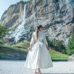 Roksana Janiszewska Instagram - Switzerland shenanigans continue… 🇨🇭🐮 Lauterbrunnen is a picturesque village set in a valley of 72 waterfalls. It’s truly a magical place that should be on your bucket list! 🥰 ps. Everyone was asking where this dress is from in my previous post! It’s from @sheinofficial @shein_gb 😍