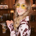 Rose Ayling-Ellis Instagram - I can’t get over @rickyandthe64 awesome work on my hair 💇‍♀️ I can’t get over how beautiful @tobileigh__ look for her birthday 🪩 I can’t get over how cool this venue is 🕺🏼💃🏼 I think I will never get bored of 70s fashion… But I don’t think I would be wearing pink velvet flare trousers anytime soon 😂 What fashion trends you followed that now make you cringe? Mine is blue mascara and straightener my side fringe into A4 sheet… 😳