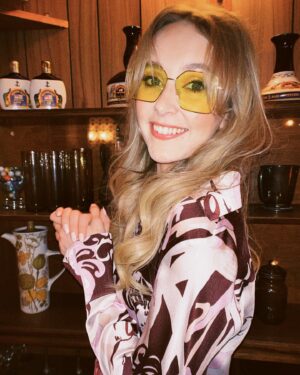 Rose Ayling-Ellis Instagram - I can’t get over @rickyandthe64 awesome work on my hair 💇‍♀️
I can’t get over how beautiful @tobileigh__ look for her birthday 🪩
I can’t get over how cool this venue is 🕺🏼💃🏼

I think I will never get bored of 70s fashion… But I don’t think I would be wearing pink velvet flare trousers anytime soon 😂 

What fashion trends you followed that now make you cringe? Mine is blue mascara and straightener my side fringe into A4 sheet… 😳