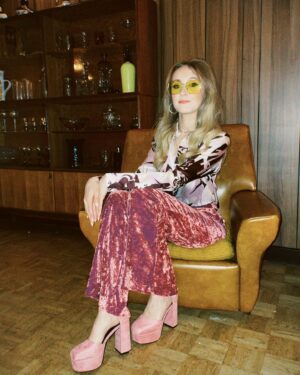 Rose Ayling-Ellis Instagram - I can’t get over @rickyandthe64 awesome work on my hair 💇‍♀️
I can’t get over how beautiful @tobileigh__ look for her birthday 🪩
I can’t get over how cool this venue is 🕺🏼💃🏼

I think I will never get bored of 70s fashion… But I don’t think I would be wearing pink velvet flare trousers anytime soon 😂 

What fashion trends you followed that now make you cringe? Mine is blue mascara and straightener my side fringe into A4 sheet… 😳