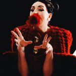 Rossy de Palma Instagram - Love @loewe RedCocoonCape by @jonathan.anderson & @andresgallardofficial CeramicFlowerJewelry together 🌹styled by @gabriella.norberg x @tarekmawad shooting for @hube.magazine by @ayafujitamakeup & @hikageyumiko thanks my Dears @safemgmt #rossydepalmapics