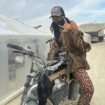 Ruby O. Fee Instagram - During the grueling and beautiful, 28-hour drive to Burning Man, we embarked on an unforgettable journey. From the days of my childhood, where I didn't just ride in buses but actually lived in one, to the exhilarating adventure of driving a colossal 40 feet long bus for the first time, this road trip with my bestie was nothing short of a journey of self-discovery. Finally, I had the chance to introduce her to the wonder that is Burning Man - a place I'd spoken of with such passion for years. Amidst the vast playa, we crossed paths with incredible souls, each encounter gifting us invaluable life lessons. It was after this incredible journey that an unexpected turn occurred. For the first time in Burning Man's history, we found ourselves stranded in the desert due to a rainstorm. 😂😅 Our fuel and water supplies ran dry, and our colossal bus began to crumble. It was then, in our moment of Chaos, that we were humbled by the kindness of strangers who not only helped us mend our bus but also warmed our hearts with their generosity. After the journey, our trip wasn't just about mud and mayhem; it was a love-infused mud bath, a MUDMAN's dream. Until next time, Burning Man. 💖 @naomiprophetess 🤍🤍🤍