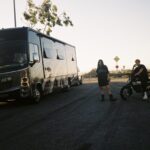 Ruby O. Fee Instagram - During the grueling and beautiful, 28-hour drive to Burning Man, we embarked on an unforgettable journey. From the days of my childhood, where I didn't just ride in buses but actually lived in one, to the exhilarating adventure of driving a colossal 40 feet long bus for the first time, this road trip with my bestie was nothing short of a journey of self-discovery. Finally, I had the chance to introduce her to the wonder that is Burning Man - a place I'd spoken of with such passion for years. Amidst the vast playa, we crossed paths with incredible souls, each encounter gifting us invaluable life lessons. It was after this incredible journey that an unexpected turn occurred. For the first time in Burning Man's history, we found ourselves stranded in the desert due to a rainstorm. 😂😅 Our fuel and water supplies ran dry, and our colossal bus began to crumble. It was then, in our moment of Chaos, that we were humbled by the kindness of strangers who not only helped us mend our bus but also warmed our hearts with their generosity. After the journey, our trip wasn't just about mud and mayhem; it was a love-infused mud bath, a MUDMAN's dream. Until next time, Burning Man. 💖 @naomiprophetess 🤍🤍🤍