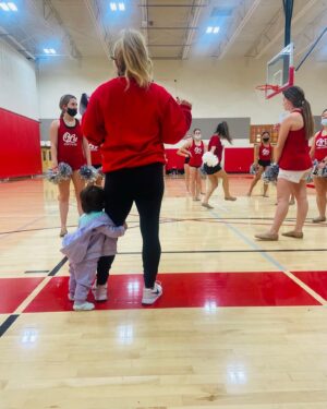 Sabrina Bryan Instagram - So blessed to be able to do something I LOVE so much everyday…and with my mini right by my side! #coachlife #mommyandme #assistantcoachoftheyear #comilliamonroe