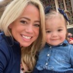 Sabrina Bryan Instagram - This season has a little extra sparkle dust for this momma bear! So happy to be back to watch my girls light the floor up in person and have our little Mustang Mascot right next to me! 🥰💙🎶❤️ #mustangpride #comilliamonroe