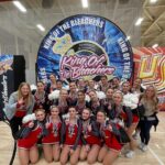 Sabrina Bryan Instagram - This season has a little extra sparkle dust for this momma bear! So happy to be back to watch my girls light the floor up in person and have our little Mustang Mascot right next to me! 🥰💙🎶❤️ #mustangpride #comilliamonroe