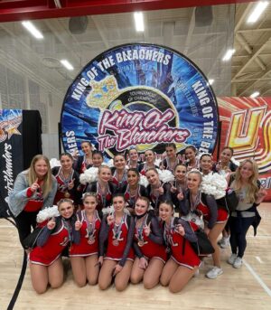 Sabrina Bryan Instagram - This season has a little extra sparkle dust for this momma bear! So happy to be back to watch my girls light the floor up in person and have our little Mustang Mascot right next to me! 🥰💙🎶❤️ #mustangpride #comilliamonroe