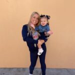 Sabrina Bryan Instagram - This season has a little extra sparkle dust for this momma bear! So happy to be back to watch my girls light the floor up in person and have our little Mustang Mascot right next to me! 🥰💙🎶❤️ #mustangpride #comilliamonroe